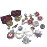 collection of vintage fire service badges