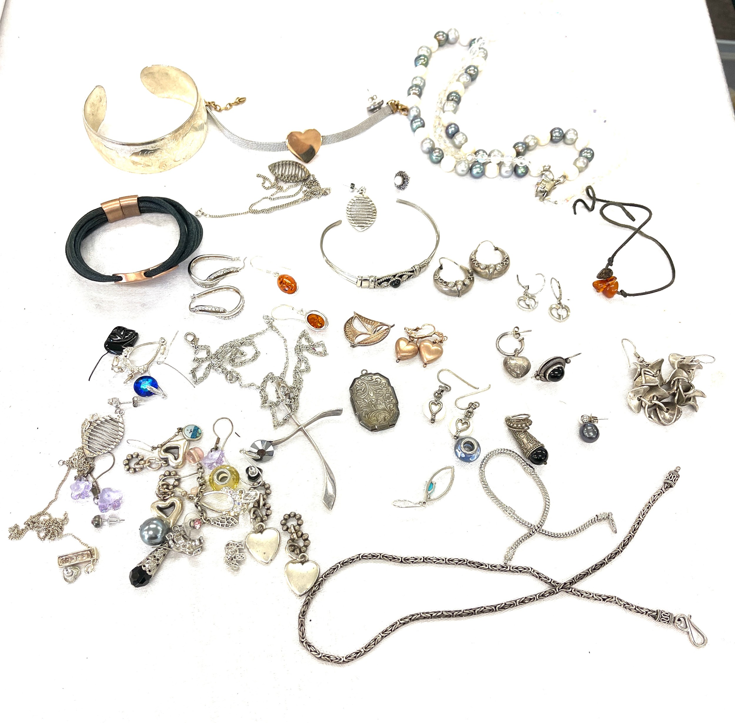 Large selection of silver and costume jewellery includes stone set earrings, bracelets etc