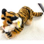 Vintage Steiff tiger stretching, with tags