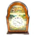 Wooden game detail mantel clock, overall height 15 inches , untested