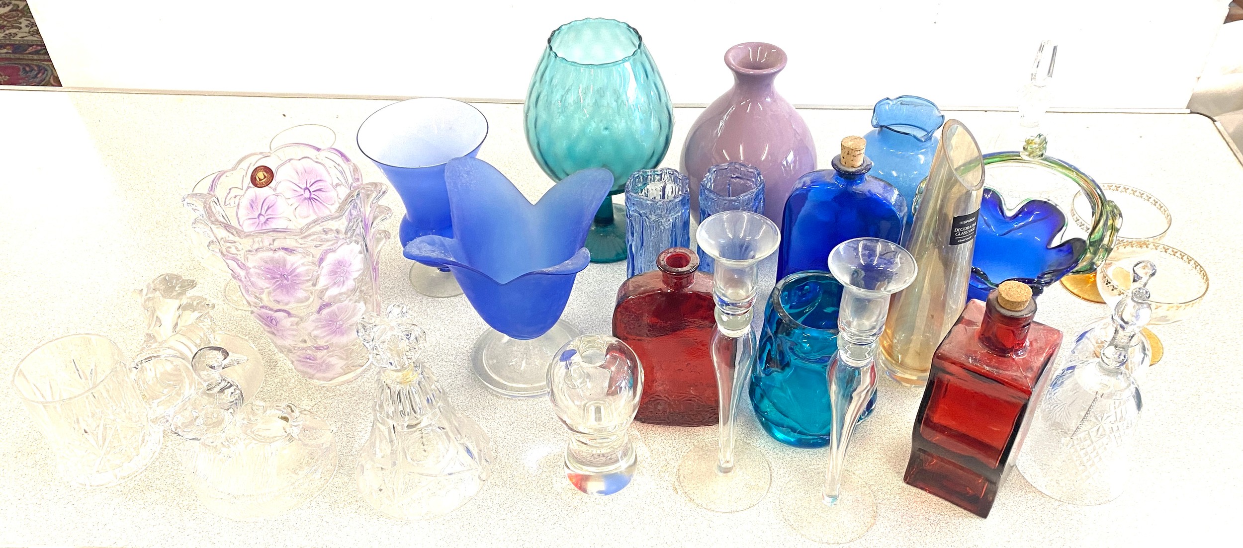 Large selection of assorted glass ware includes Coloured glass, Vases etc