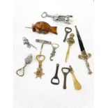 Selection of vintage and later Novelty cork screws/ bottle openers etc