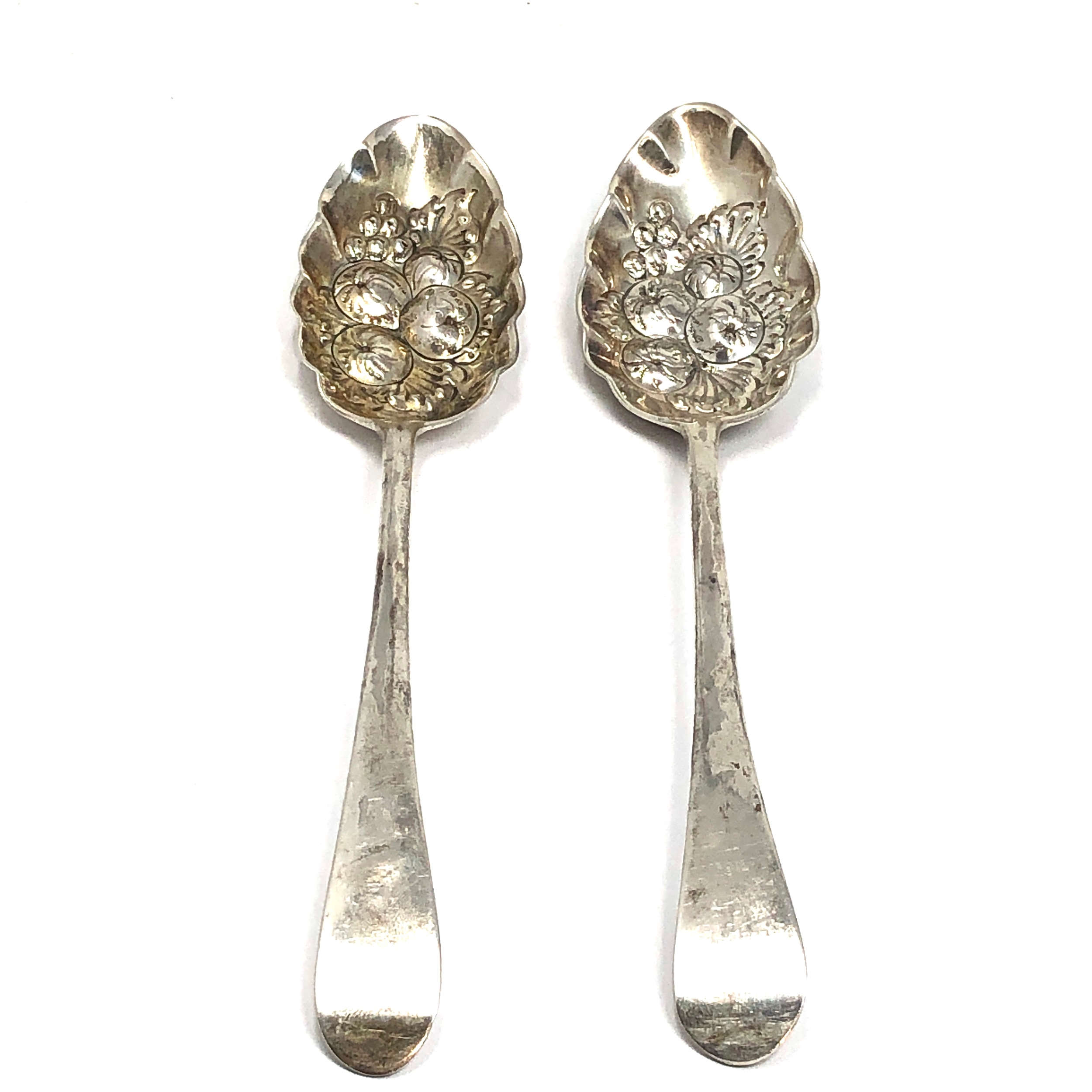 Pair of antique georgian silver berry spoons London silver hallmarks weight 123g each measure approx