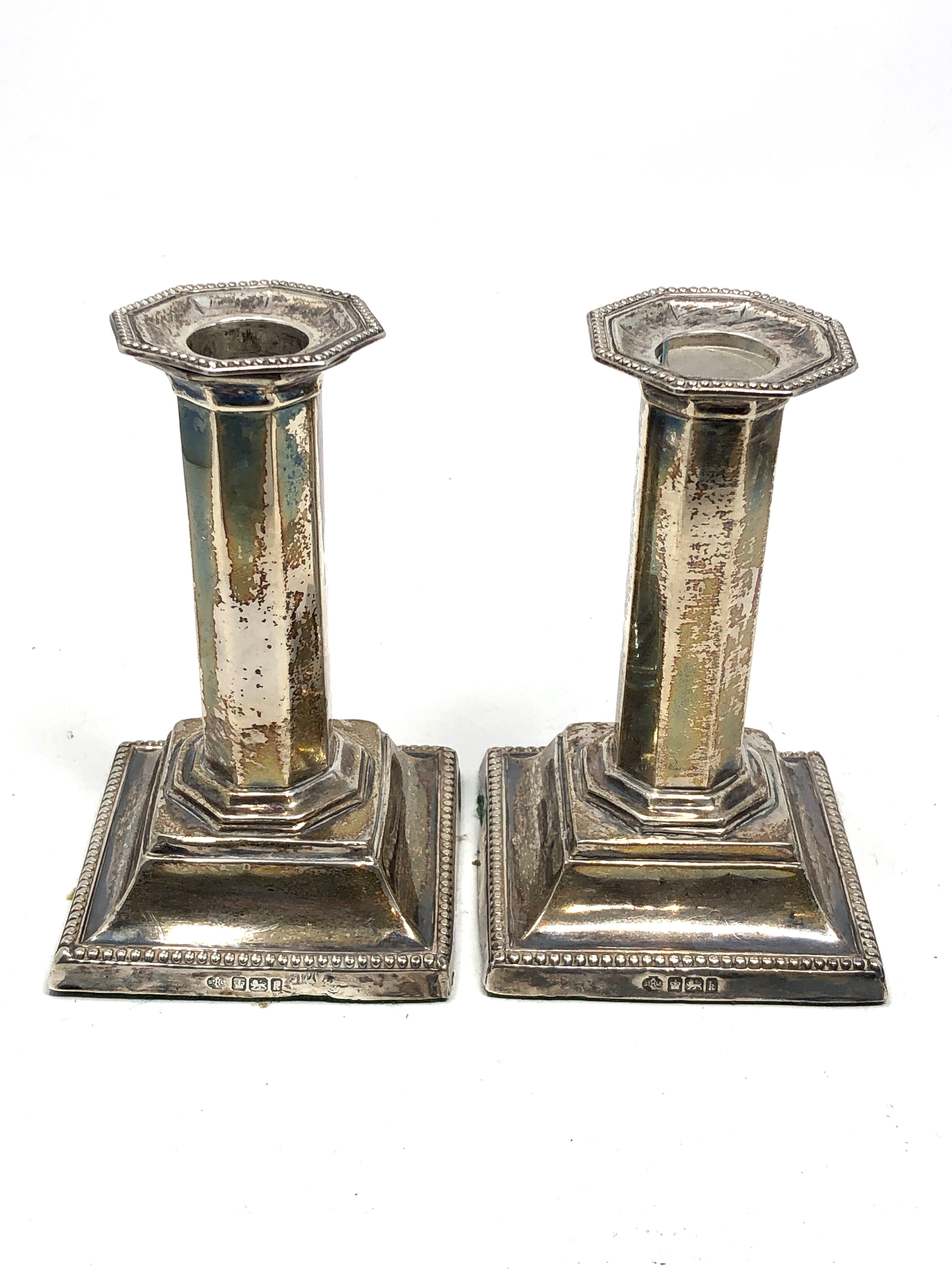 Pair of antique silver candlesticks measure approx 13cm tall Sheffield silver hallmarks