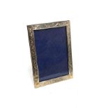 Vintage silver picture frame measures approx 17.5 by 12.5 cm