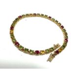 9ct gold gemstone set tennis bracelet set with rubies citrine peridot weight 11.1g