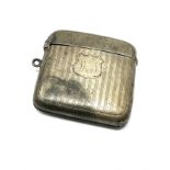 Silver vesta case made into a cigarette lighter