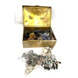Selection of vintage and later costume jewellery in a brass case