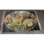 Vintage wall hanging rug depicting a deer, measures approx 75 inches wide by 46 inches tall