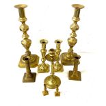 Selection of vintage brass candlesticks- tallest measures 14 inches tall