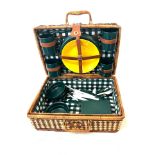 Wicker picnic hamper with contents