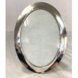 Vintage silver hallmarked oval photo frame, wooden backed, measures approx 9.5 inches tall 7