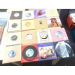 Large selection of 45s includes The Jacksons, The flying pickets, etc in 2 cases