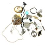 Selection of costume jewellery to include brooches, compact etc
