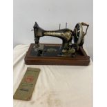 Vintage cased singer sewing machine