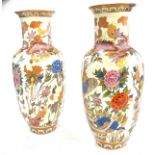 Pair of oriental style vases- approx height 12 inches