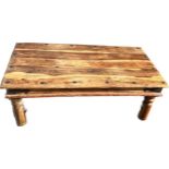 Wooden and metal coffee table measures approx 16 inches high by 43 wide and 24 deep