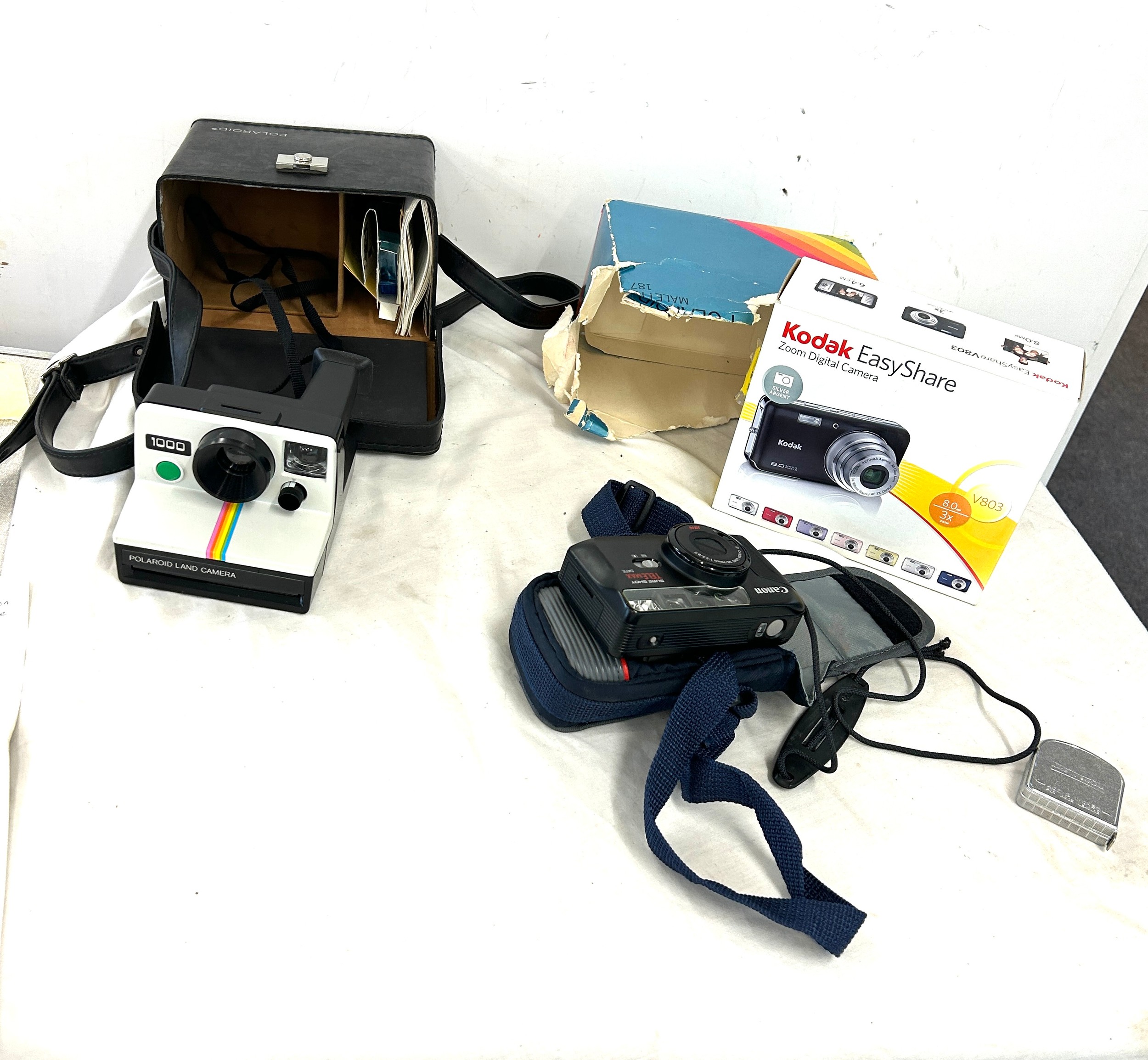 Selection of vintage and later cameras includes Polaroid, Kodak easy share etc