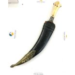 Antique 19th century Indian tiger tooth Jambiya dagger knife in leather covered wooden scabbard.