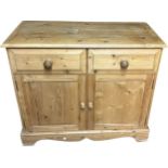 Pine two door two drawer small sidebaord measures approx 38 inches long by 18 inches deep and 32