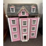 Large painted pink dolls house, measures approx 36.5 inches tall 27 inches wide 16 inches depth