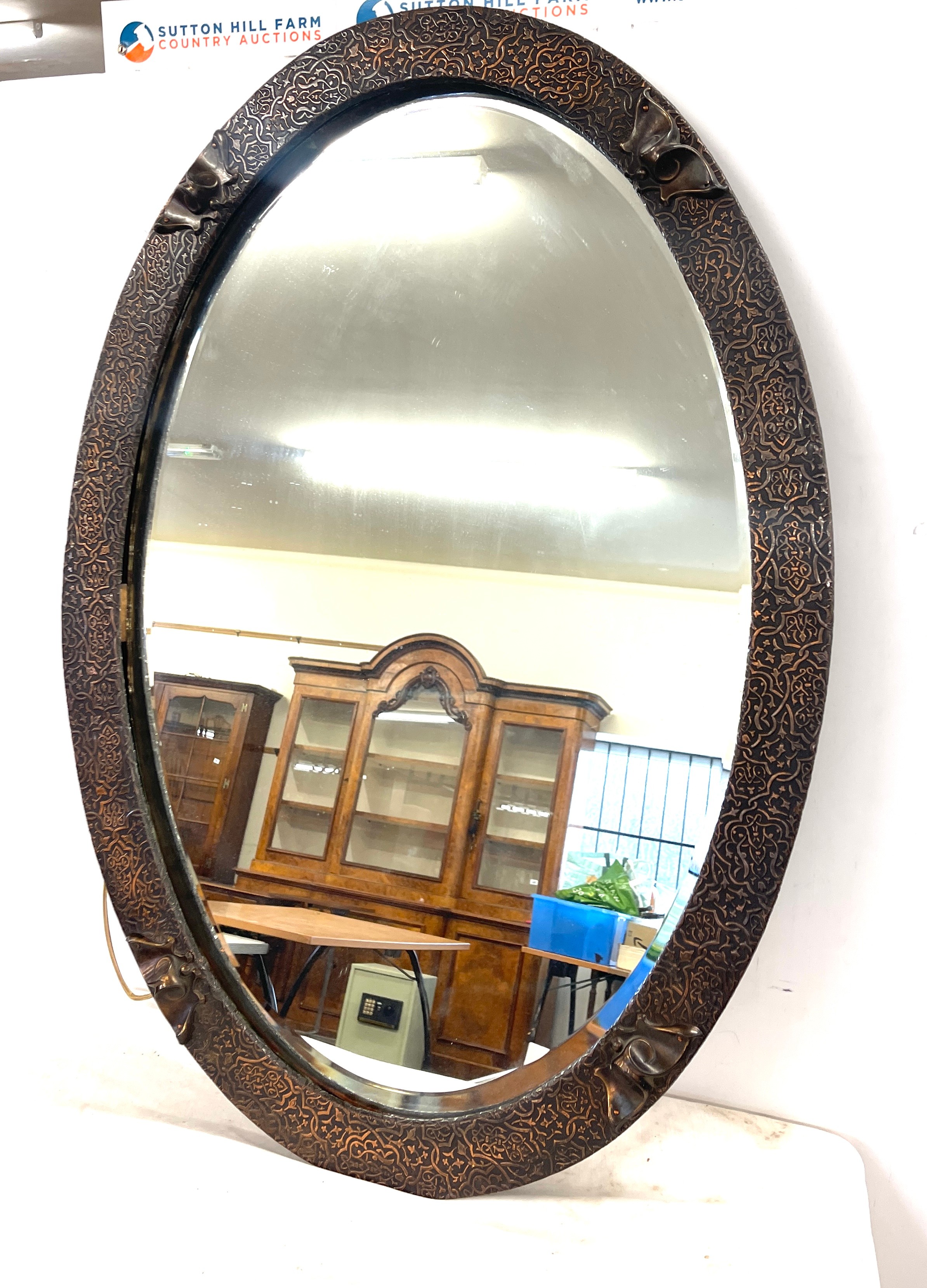 Oriental oval framed mirror measures approx measures approx 34 inches by 23 inches