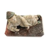 Unusual Chinese carving of a reclining oriental man on hard stone base