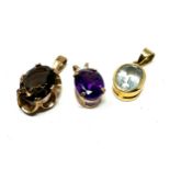 3 x 9ct yellow gold pendants inc. aquamarine, amethyst & smokey quartz (3.4g)