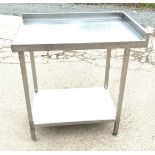 Stainless steel table , approximate measurements Height 36 inches. Width 33 inches, Depth 22 inches