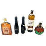 Selection of alcohol includes Ameretto, Bols, Sam adams, all sealed