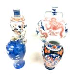 4 Pieces of Chinese pottery includes vases, marks to base, largest measures approximately 14