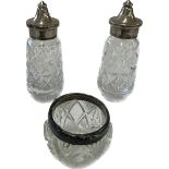 Pair of silver lidded salt and pepper pot and a silver rimmed pot