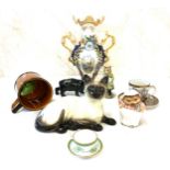 Selection of collectables includes Beswick cat, oriental cup and saucer, Beatrix Potter, Crown Devon