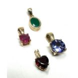 4 x 9ct gold pendants inc. emerald, ruby, garnet. tanzanite (2.4g)