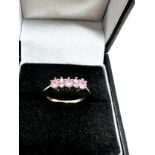 9ct gold diamond & pink sapphire seven stone ring (1.5g)