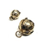 2 x 9ct gold masonic orb pendants (10.2g)