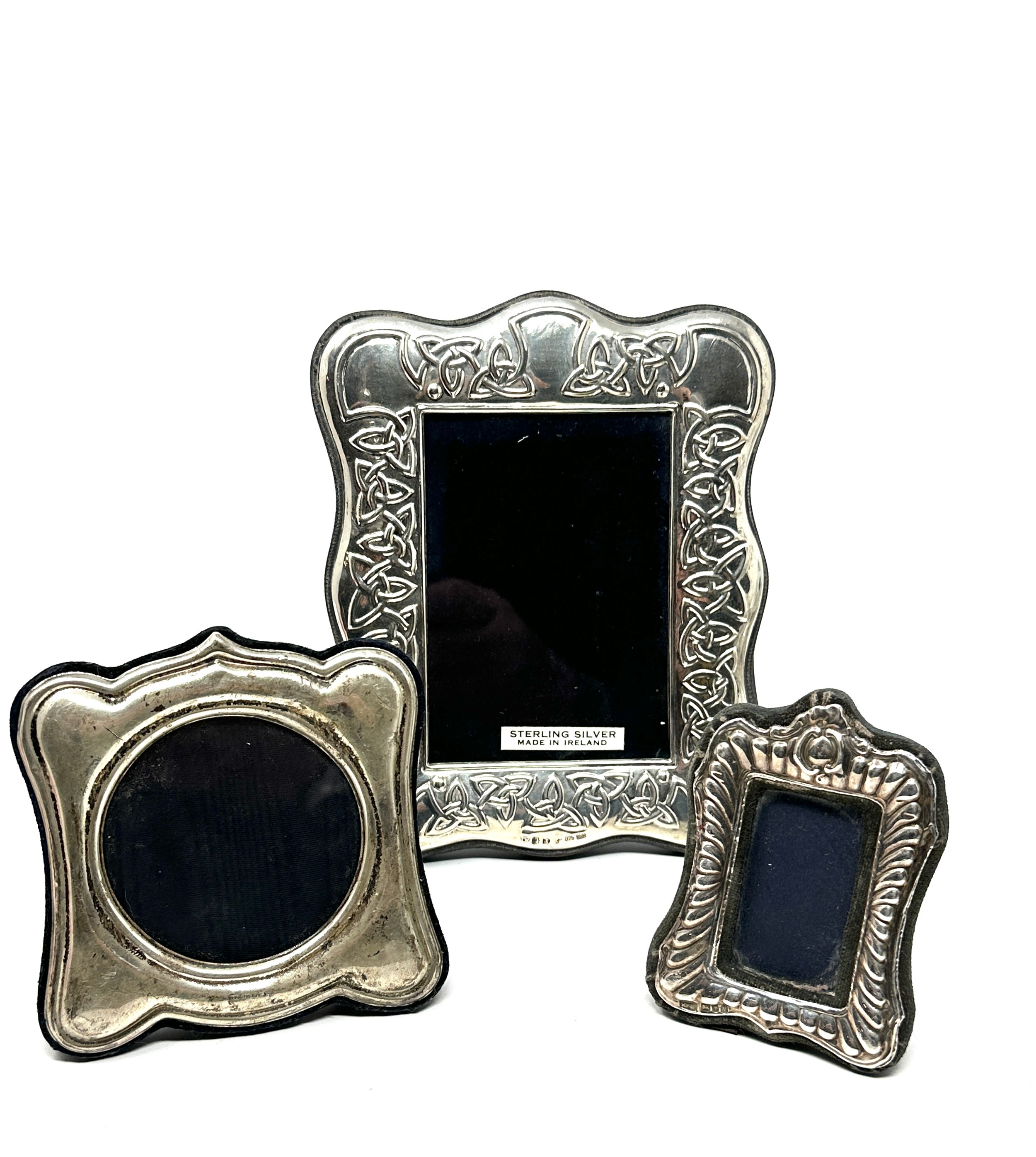 3 silver picture frames largest measures approx 15cm by 12cm