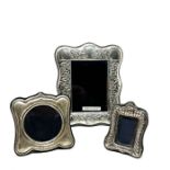 3 silver picture frames largest measures approx 15cm by 12cm