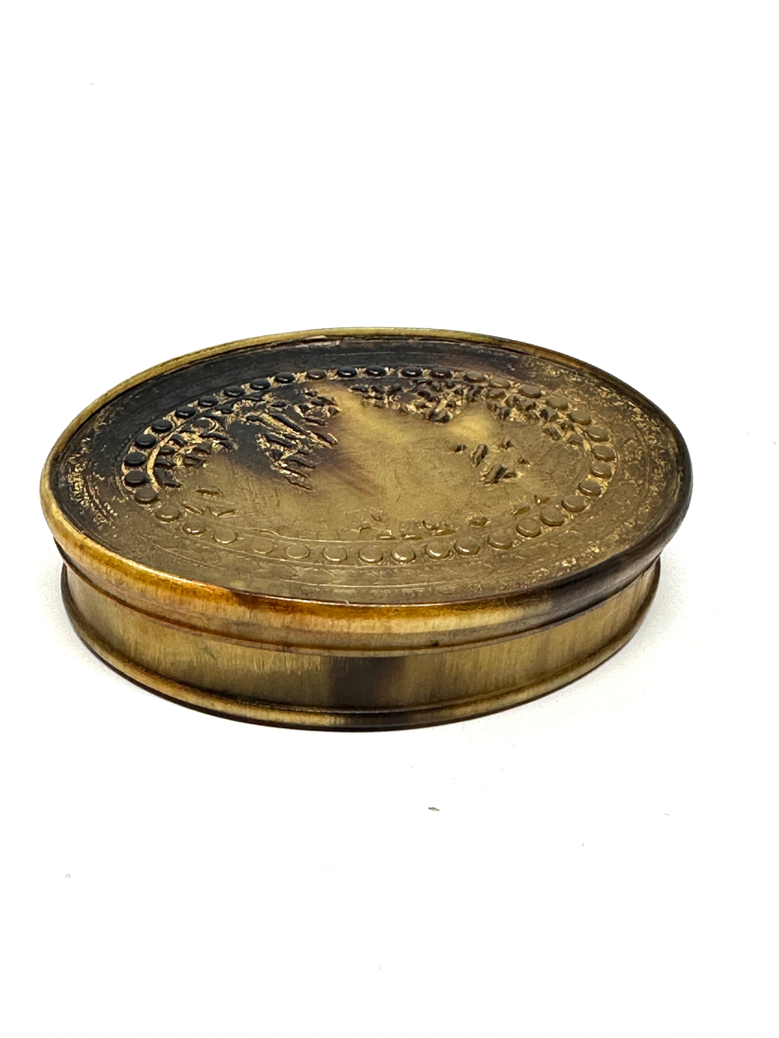 Fine antique georgian horn box snuff box embossed with Britannia detail to lid measures approx 8cm