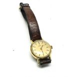 Vintage ladies omega wrist watch and omega leather strap the watch is not ticking
