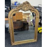 Large ornate gilt framed mirror measures approximately 115cm tall 80cm wide