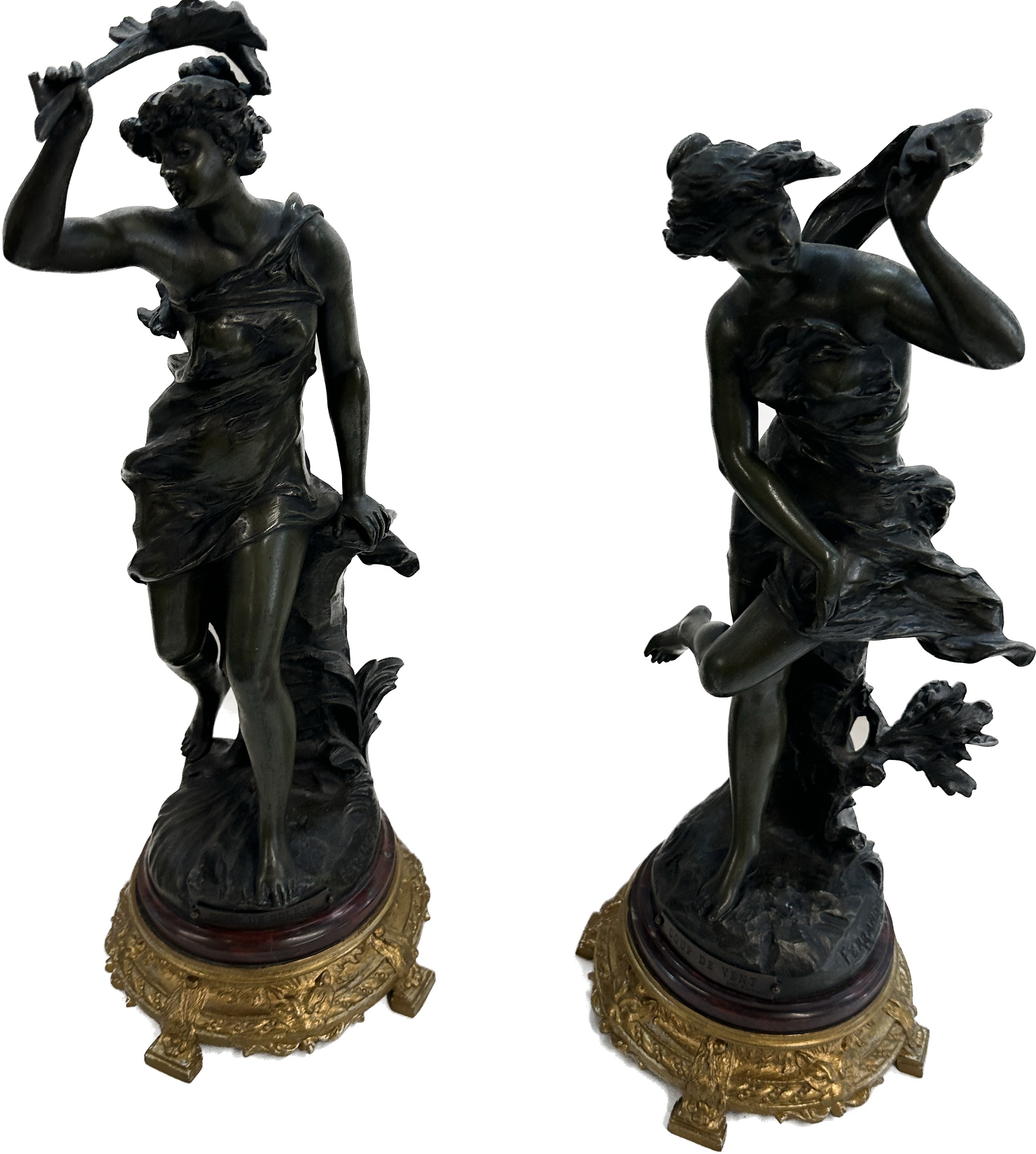 Pair of decorative figures on a base 17 inches tall
