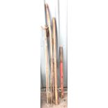 Selection of pig tail iron stakes and crow bars etc