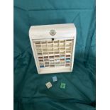 Vintage dental cabinet with dental drills with roller shutter measures approx 10 inches tall by 8