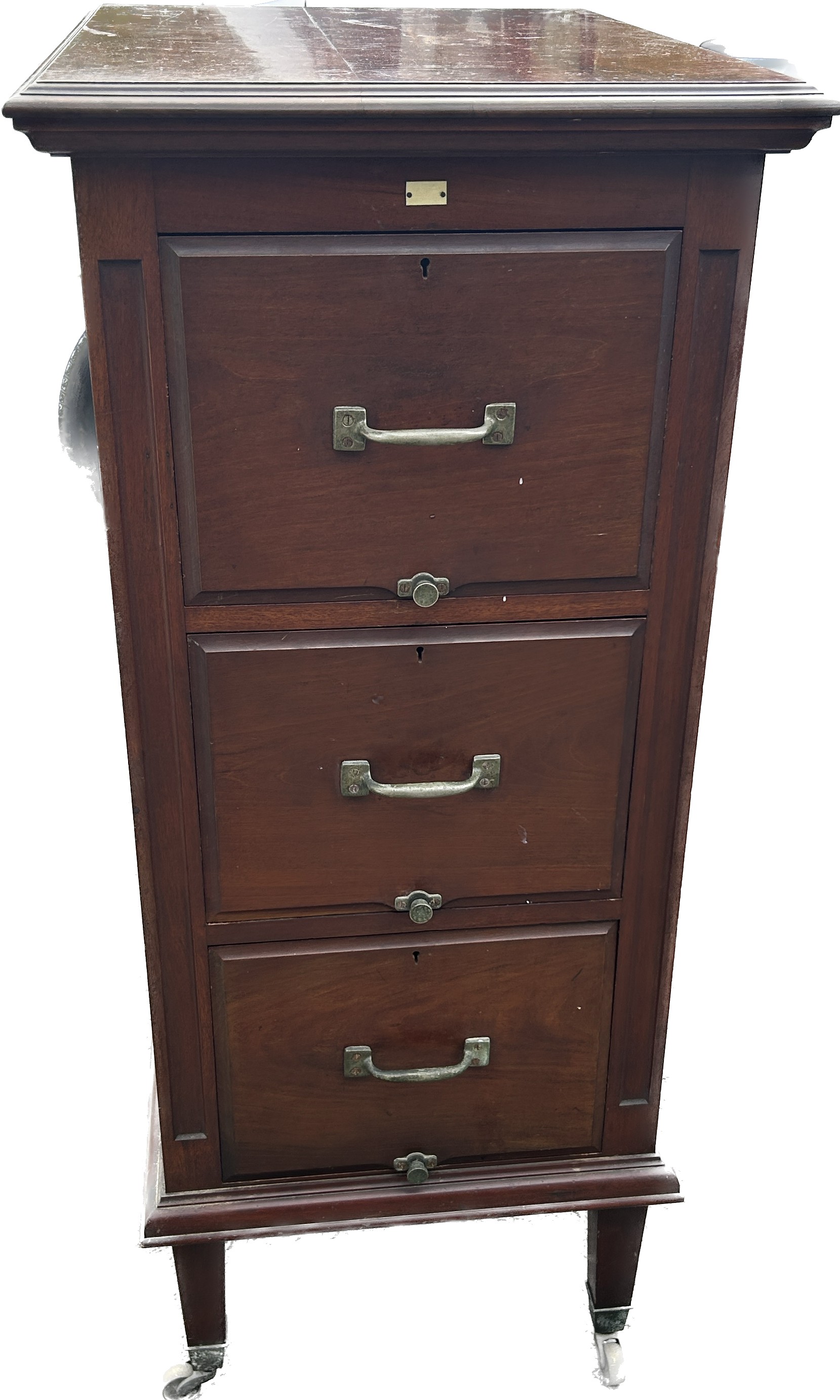 Mahogany Edwardian three drawer filing cabinet with panelled sides and back and brass casters