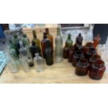 Large selection of vintage and later coloured glasses/ medicine bottles etc