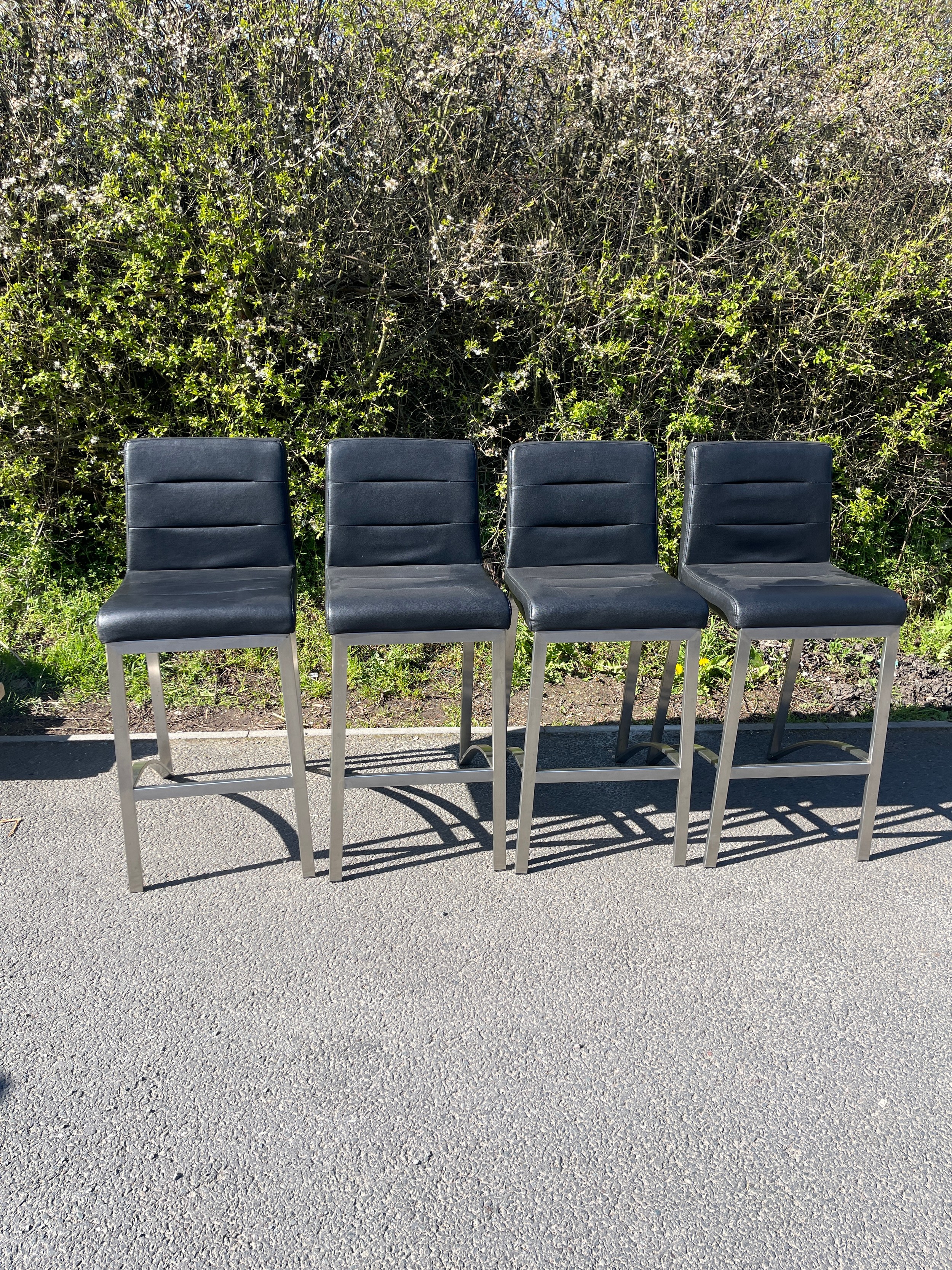 Set of 4 chrome and faux leather bar stools