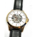 Rotary skeleton dial automatic gents wristwatch the watch is ticking