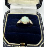 9ct gold opal ring 2.3g central opal measures approx 8mm dia