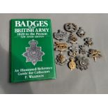 12 military cap badges inc shropshire yeomanry leicestershire 3rd carabiniers complete with book